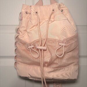 Dagne Dover Nova Repreve Recycled Polyester Sling Bag in the Rose Quartz